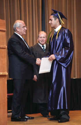 Berge Setrakian with a new graduate at AGBU Alex & Marie Manoogian School where he also served as the ceremony’s keynote speaker. (2018)