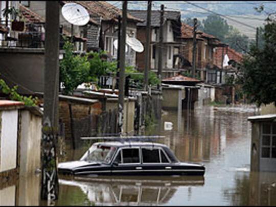 A Bulgarian town is submerged in flood waters. Last summer's