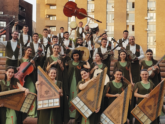 The Naregatsi Folk Instruments Orchestra adds a twist to traditional Armenian music with the addition of a classical cello (second row left), violin (third row) and bass (last row).