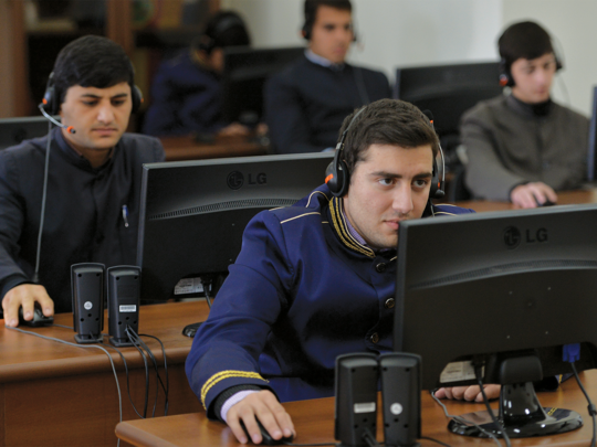 Armenian seminary students connect to a world of theological and general knowledge online, augmenting their coursework at the Gevorgyan Seminary of the Mother See in Etchmiadzin