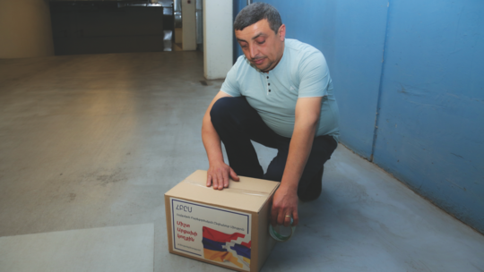 Now employed by AGBU, Armen Yessayan is in charge of preparing and delivering relief packages for refugee families.