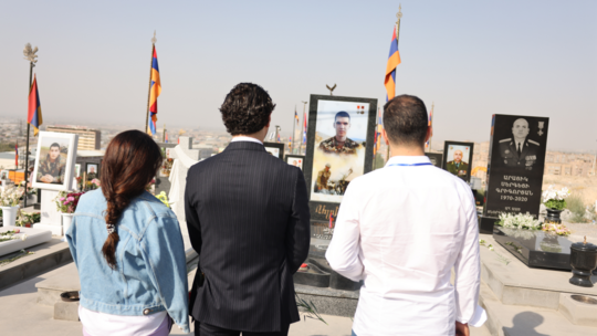 AGBU Young Professionals pay respects to a fallen soldier of the Artsakh War during group visit to Yerablur Military Pantheon